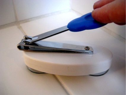 Nagelknipser mit Saugn�pfen